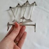 6 Silver metal knife holders