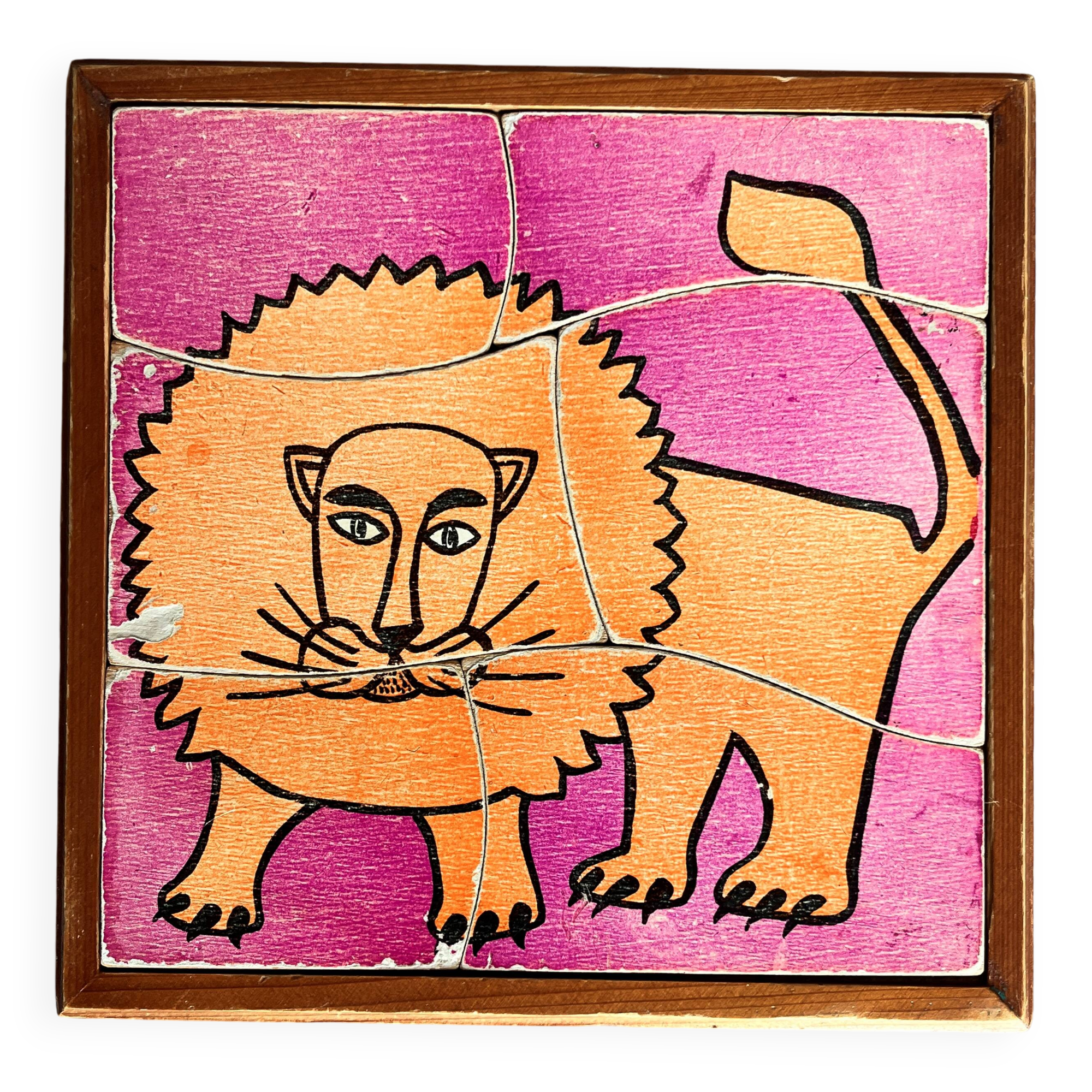 Wooden frame puzzle from the 1960s depicting a lion.