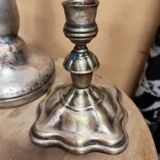 Set of three silver candle holders