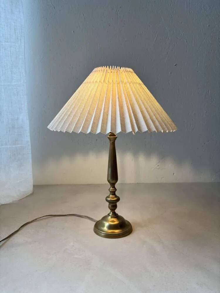 Brass table lamp with pleated shade, 1960s vintage design.