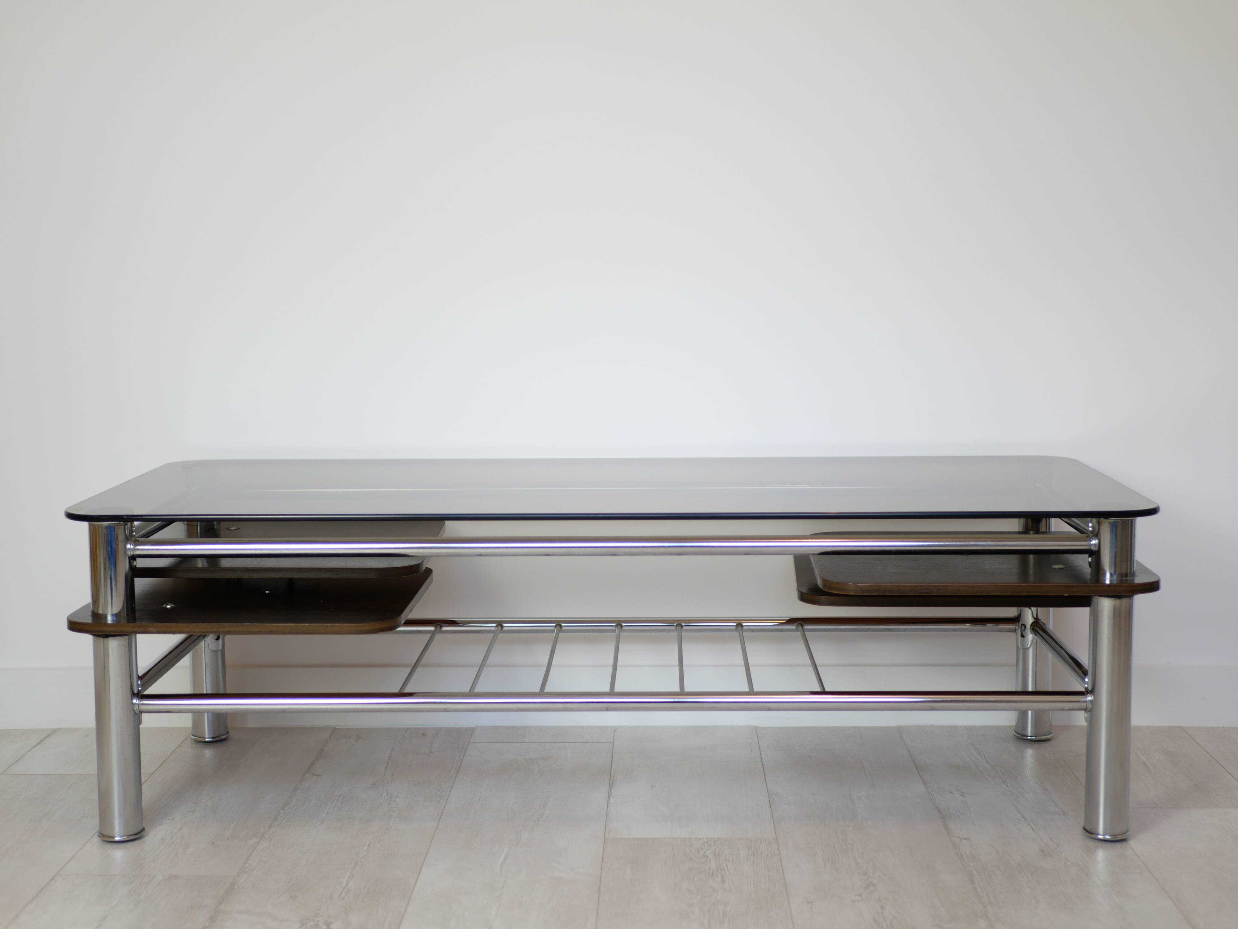Chrome metal coffee table with smoked glass top.