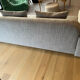 Three-seater fabric sofa