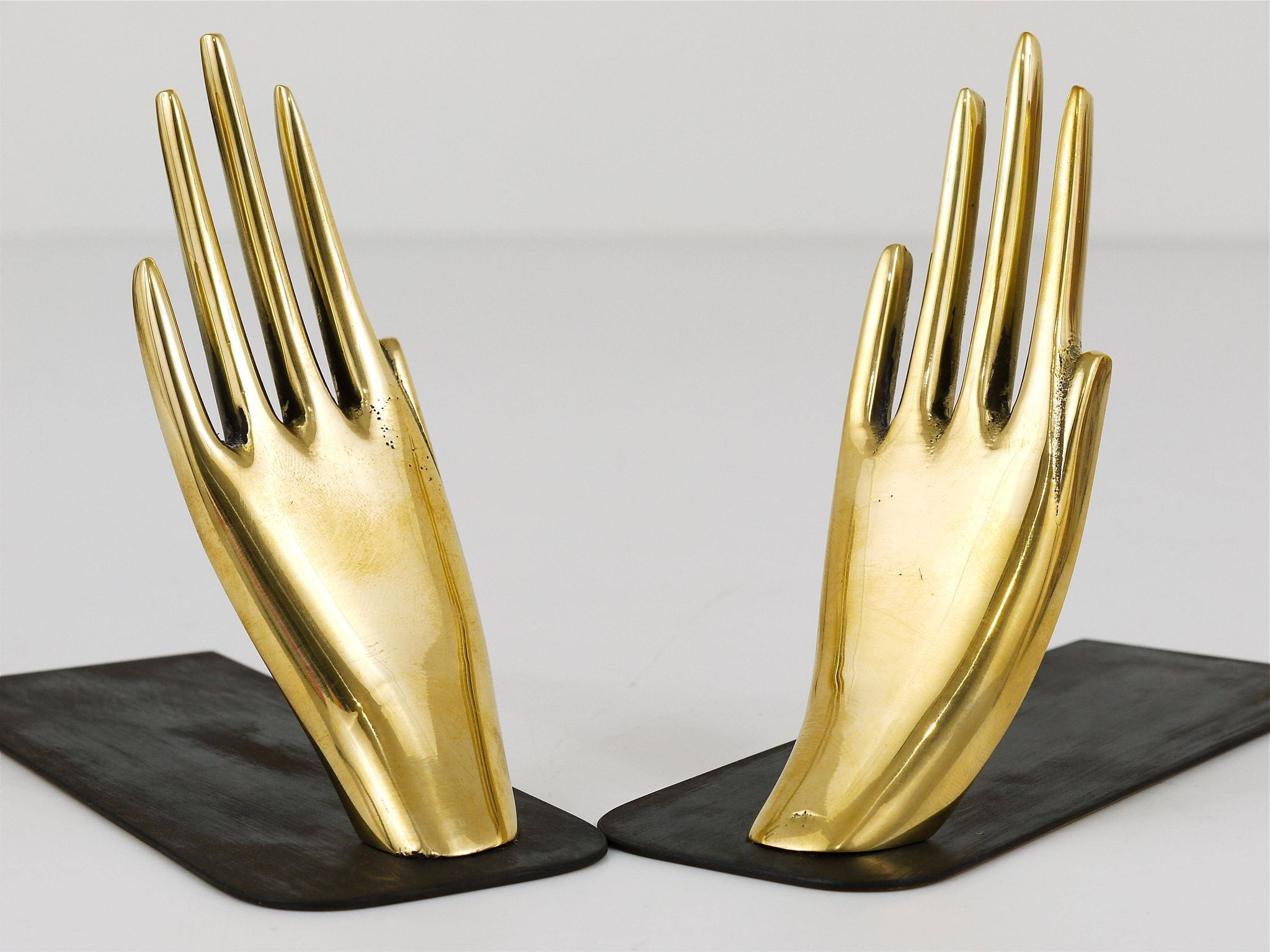 Mid-century bookends by Carl Auböck with brass hands #1928, Vienna, Austria
