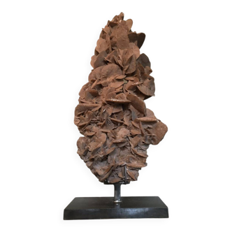 Sandy rose with a base