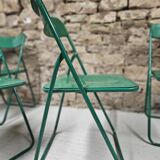 Set of 6 green folding patio chairs