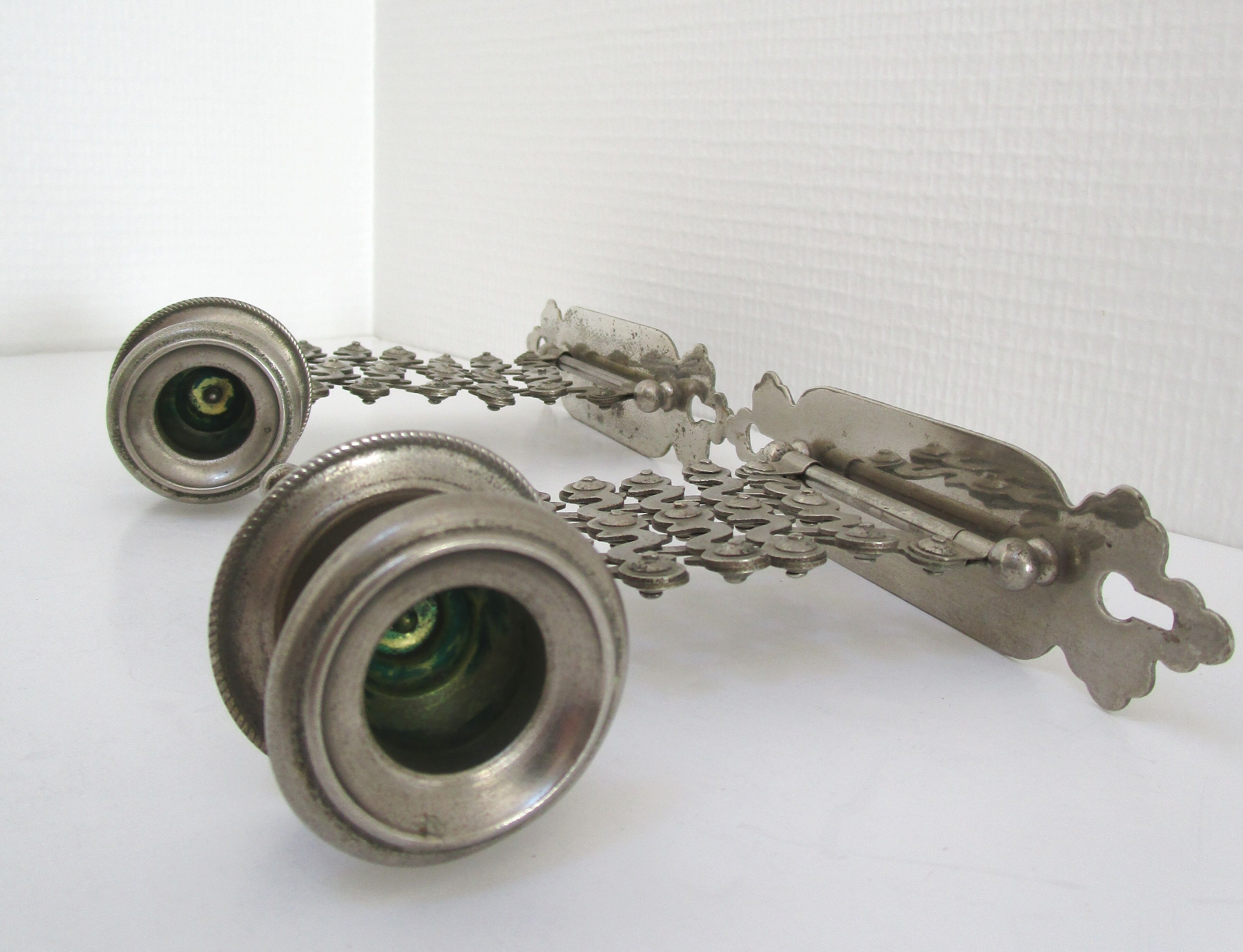 Pair of extendable old metal candlesticks