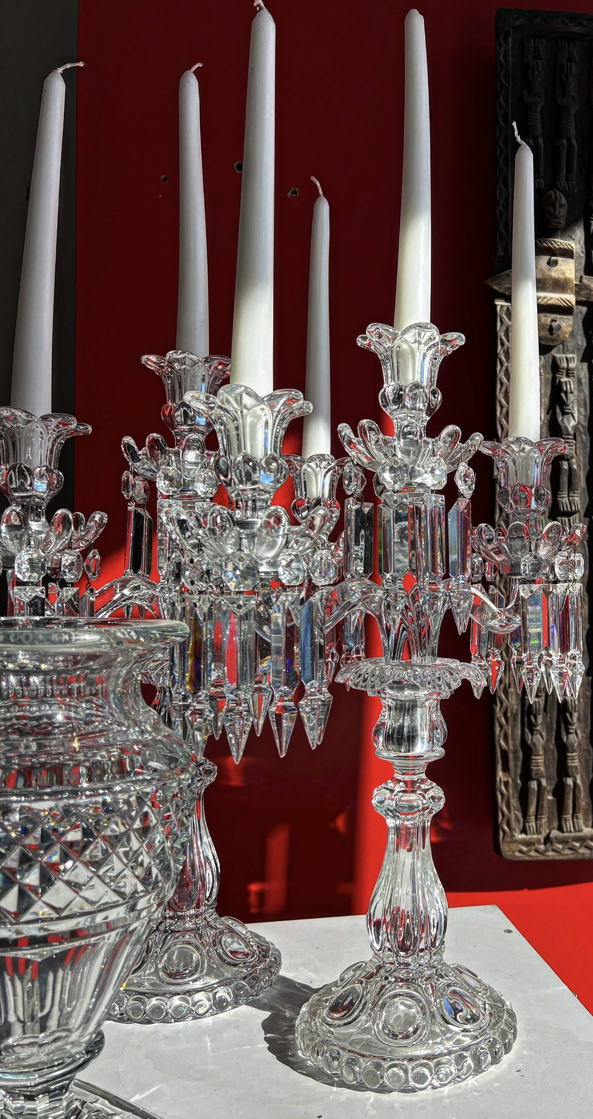 Pair of Baccarat three-light crystal chandeliers