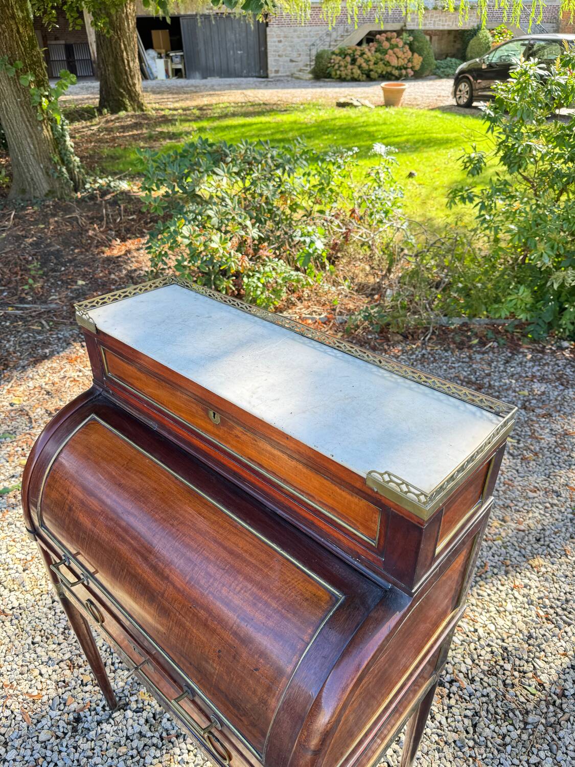 Elegant and rare Louis XVI period mahogany cylinder desk
