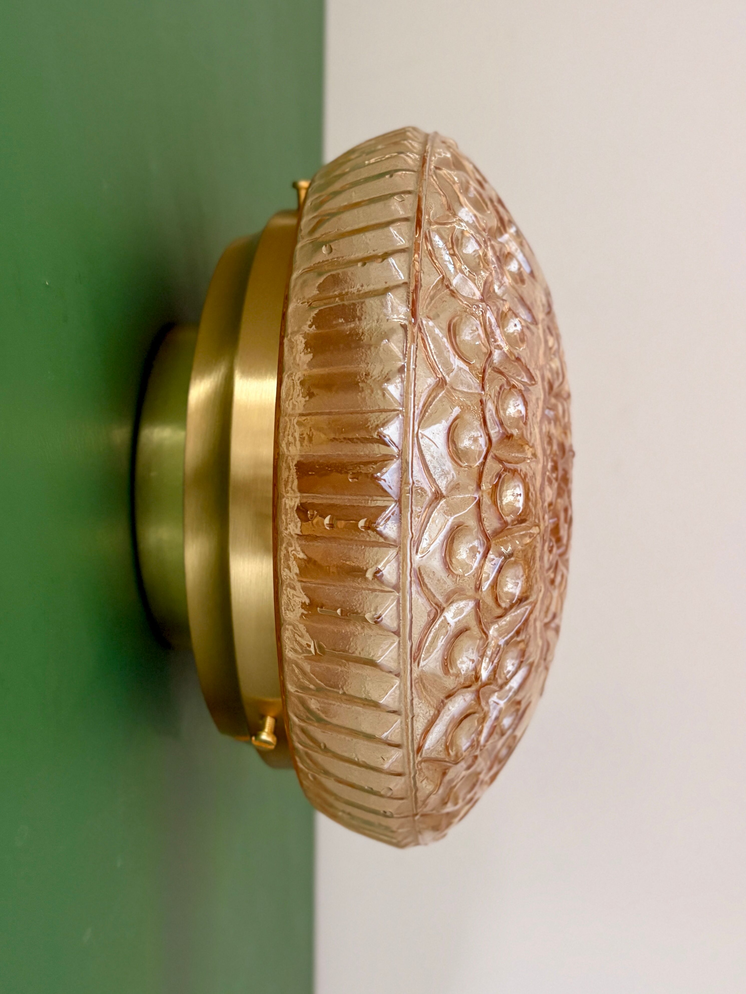 Vintage amber glass globe wall/ceiling light.