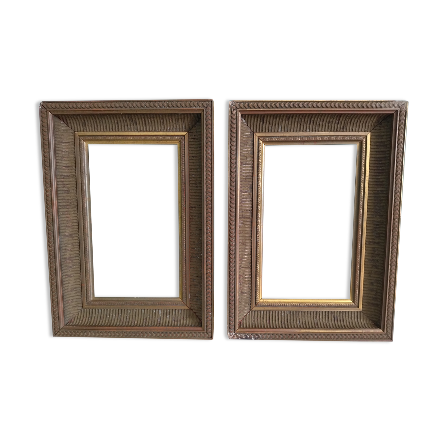 Pair of frames in old carved wood