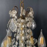 Small antique chandelier with tassels and bronze from the early 20th century
