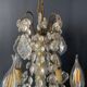 Small antique chandelier with tassels and bronze from the early 20th century