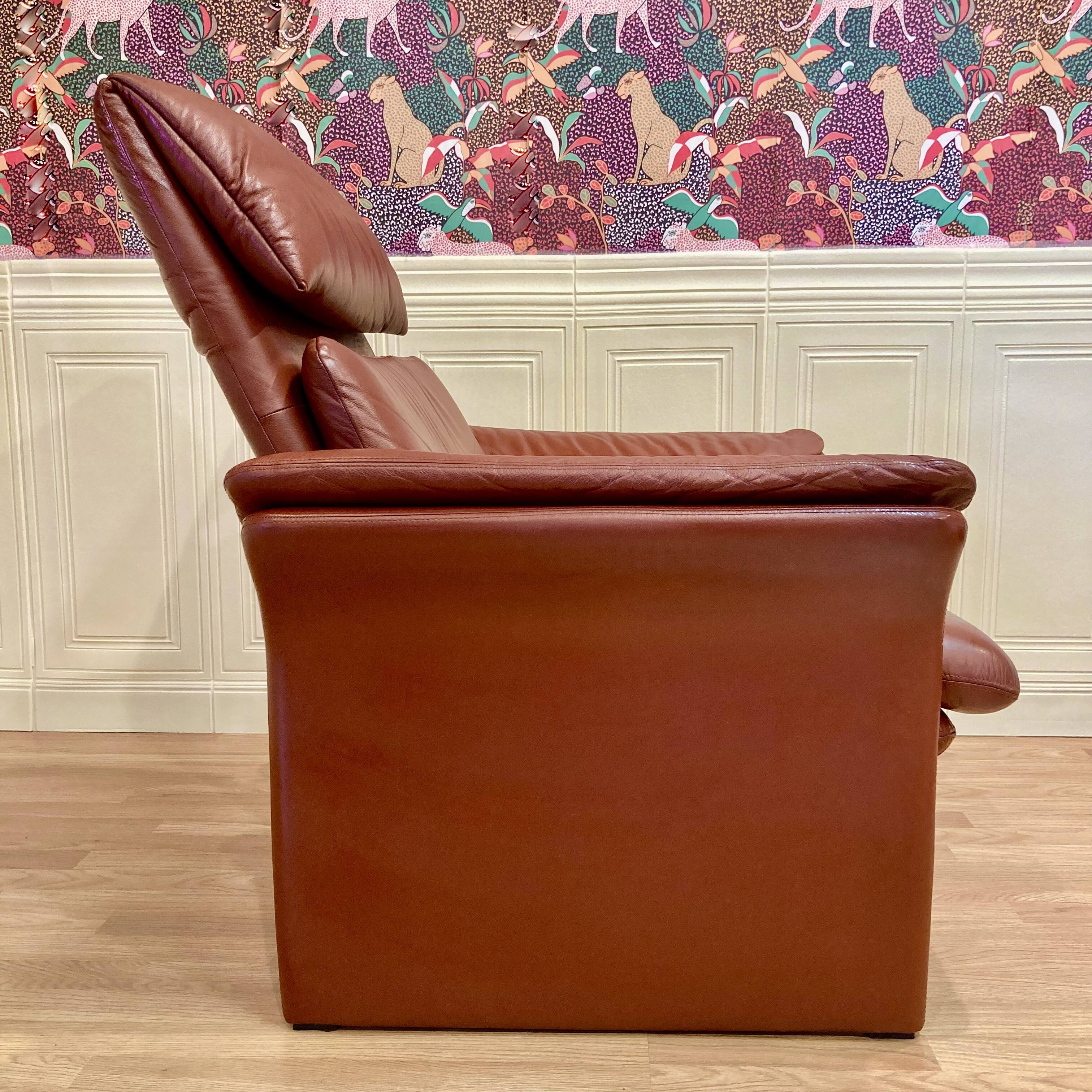 Pair of "Erpo" designer adjustable leather armchairs.