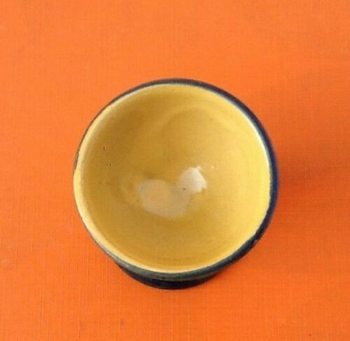 Old shell glazed terracotta eggcup