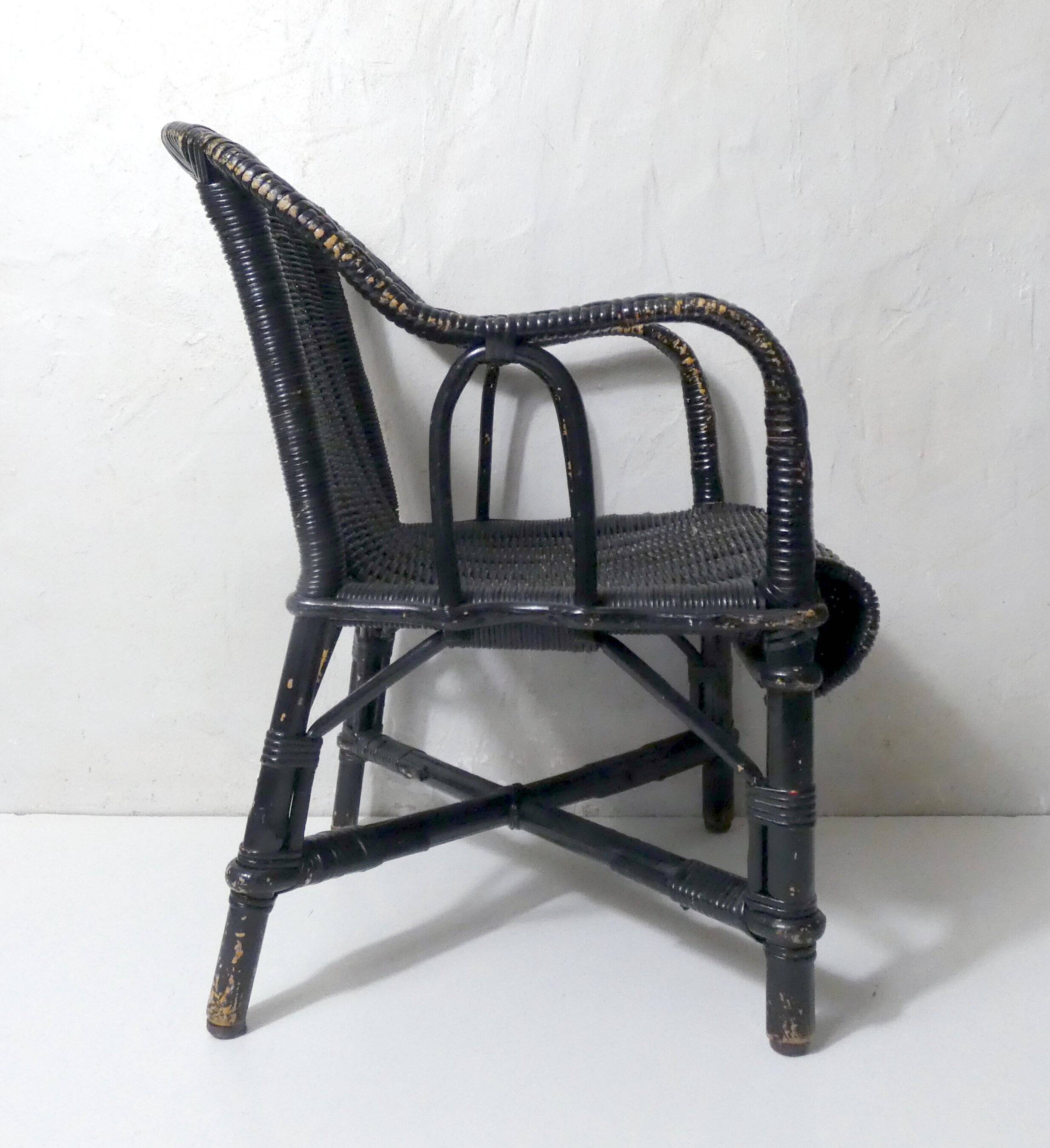 Vintage children's size rattan armchair