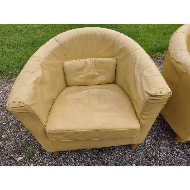Paire de fauteuils simili cuir marron clair vintage