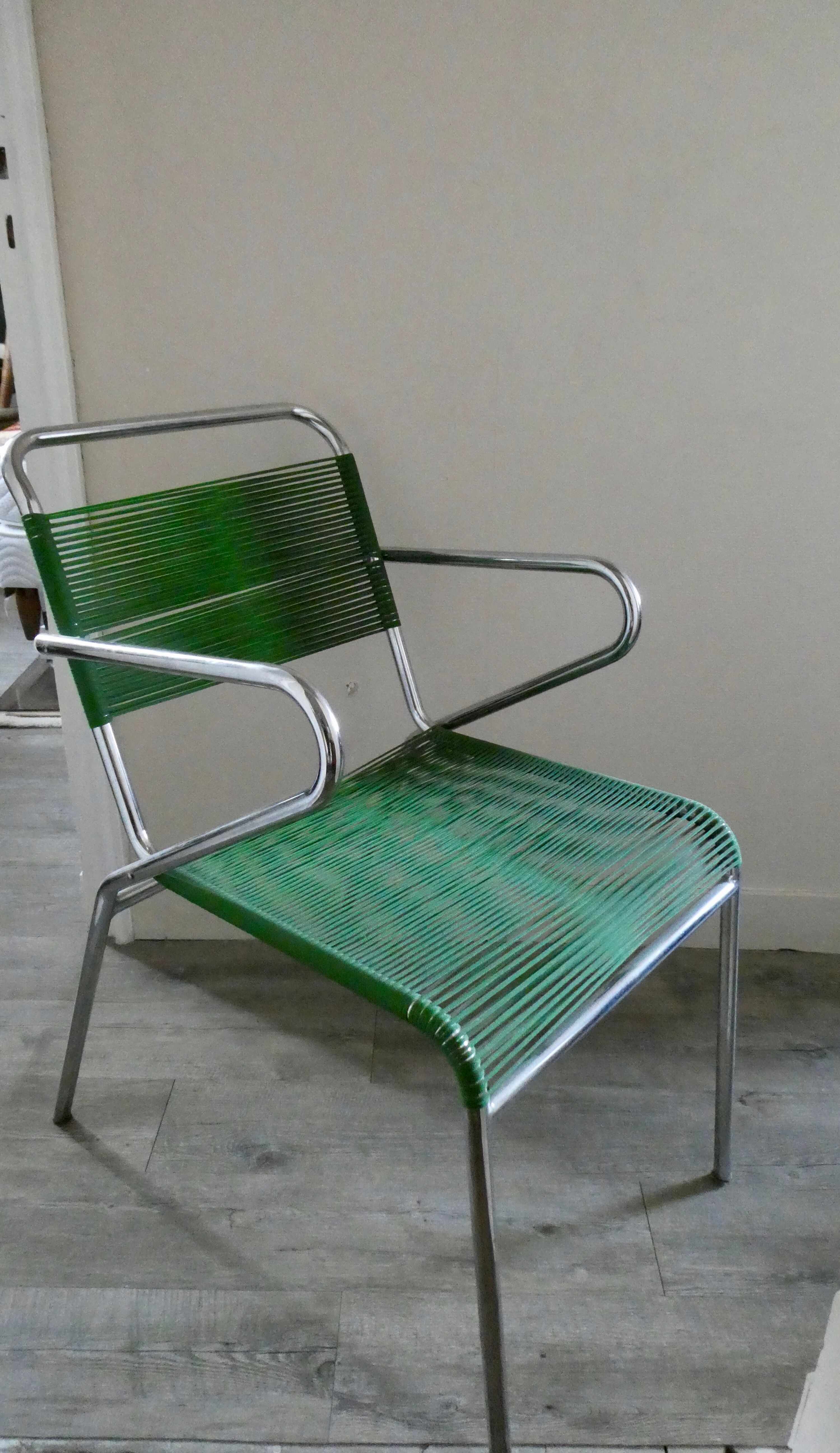 Metal chair and ropes