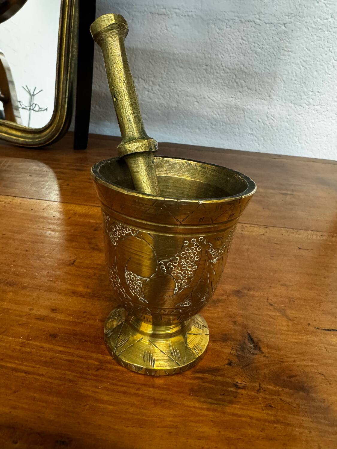 Golden brass mortar and pestle