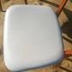 vintage wooden chairs with white faux leather