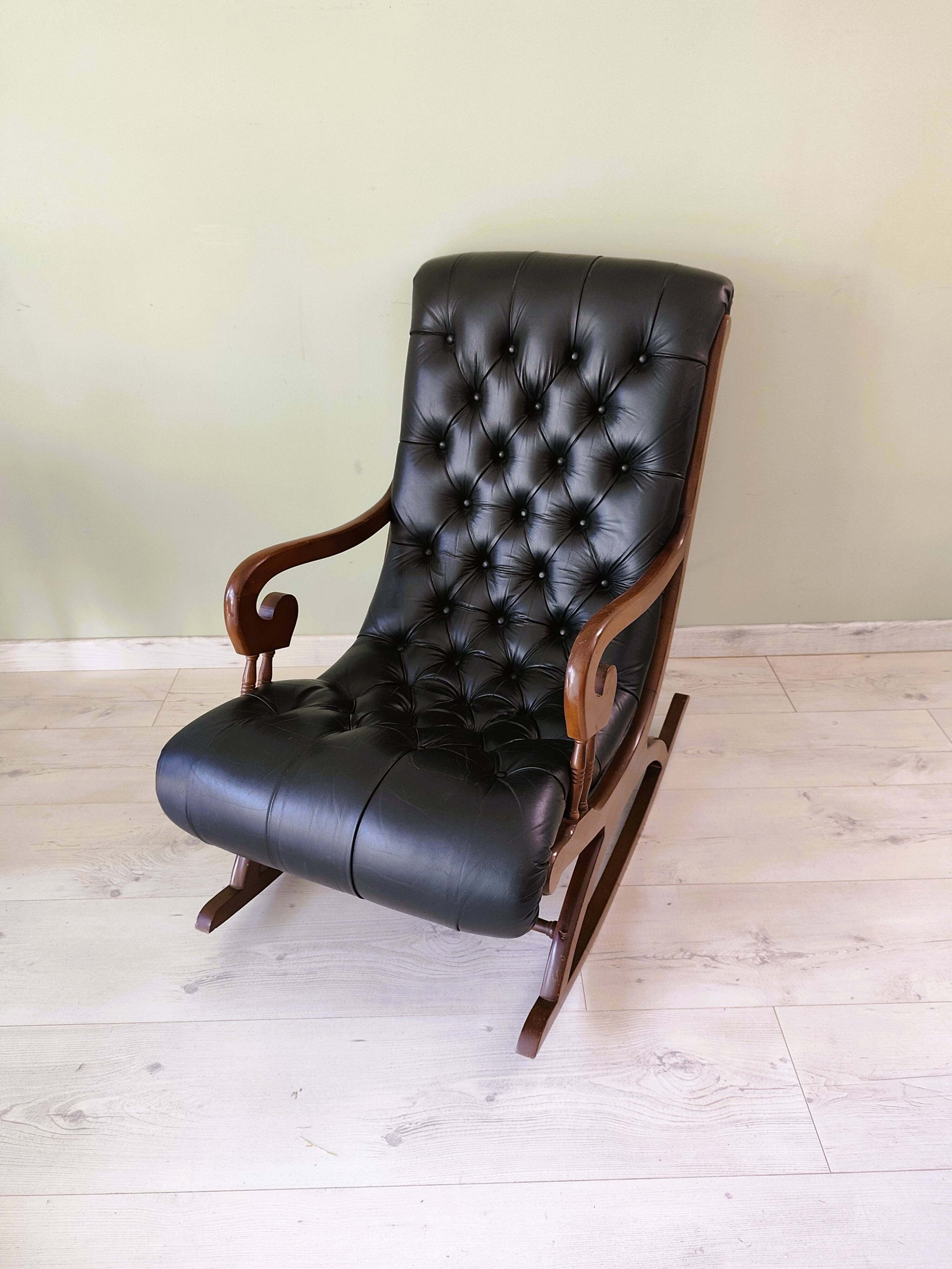 Black leather rocking Chesterfield armchair