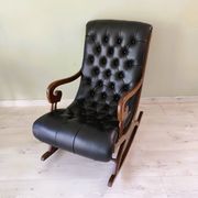 Black leather rocking Chesterfield armchair