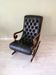 Fauteuil Chesterfield a bascule en cuir noir