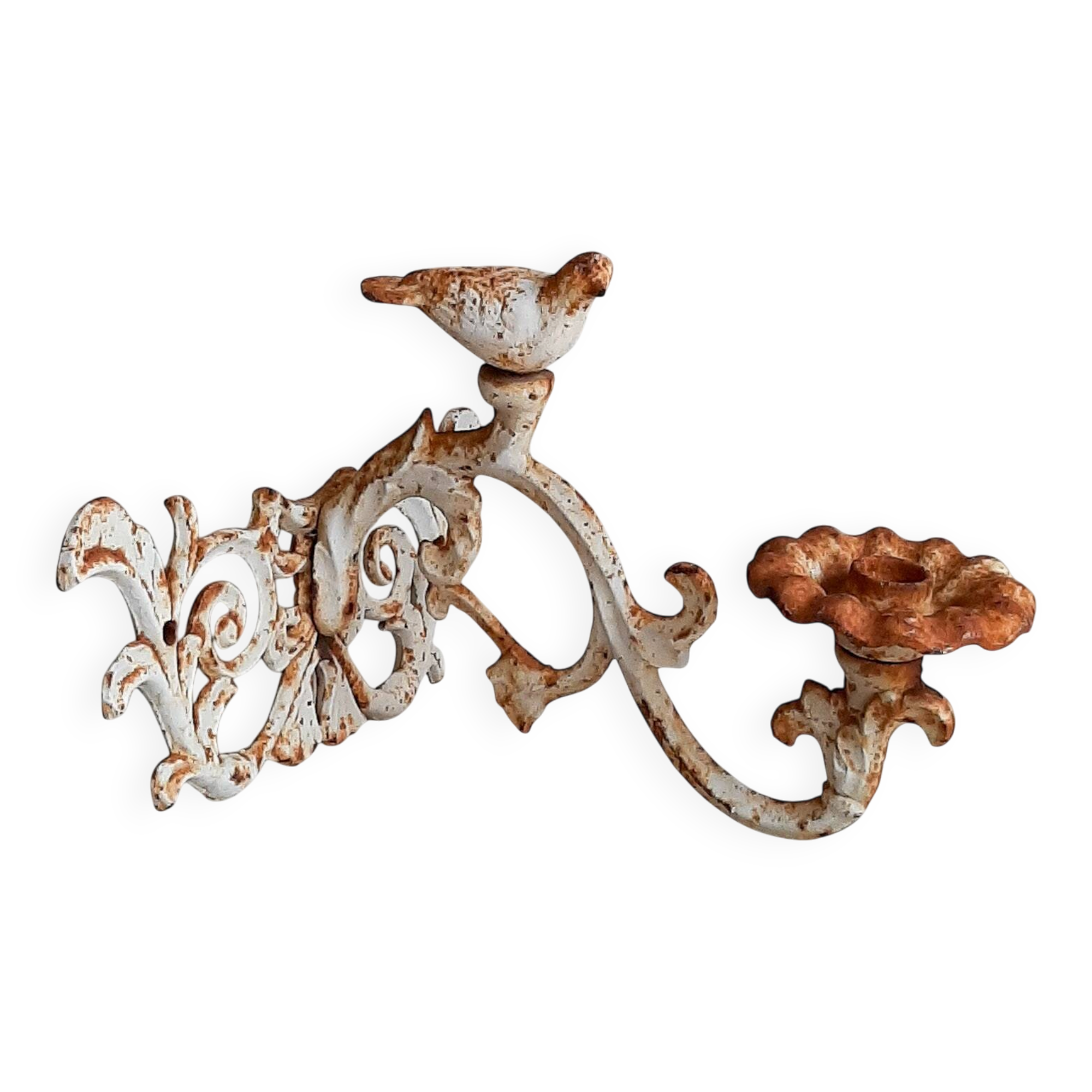 Wall lamp in antique cast iron with bird and scroll decorations.