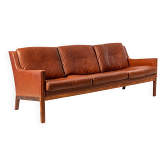 Canapé 3 places en palissandre et cuir de Kai Lyngfeldt Larsen