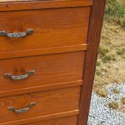 Vintage 1950s chest of drawers with tapered legs and 5 drawers.