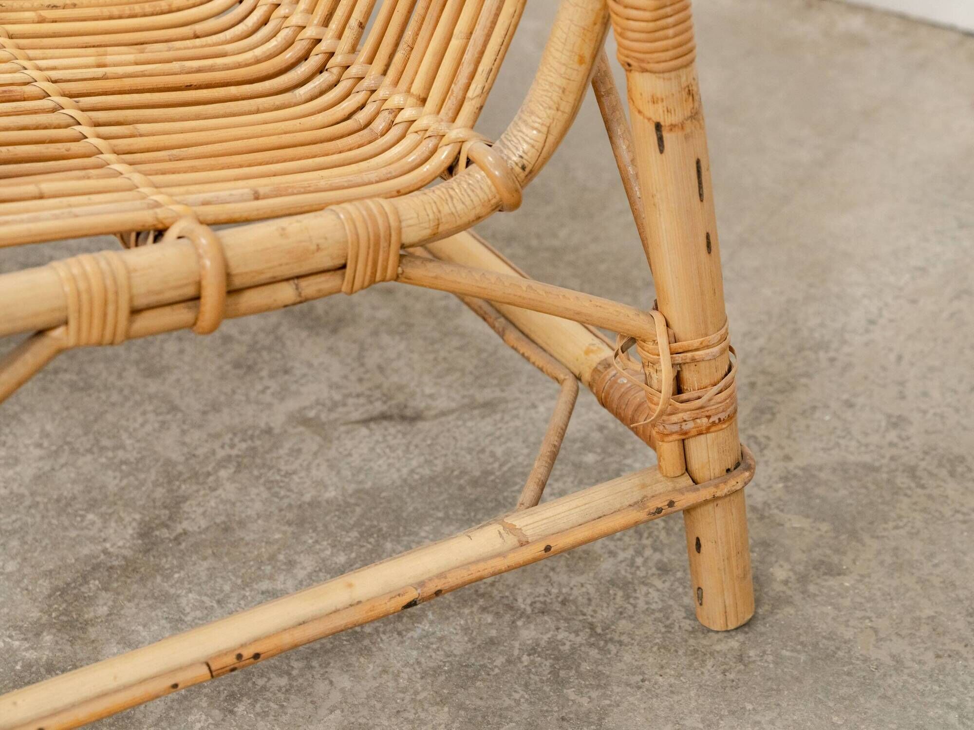 Vintage bamboo and rattan bench from the 1970s.