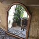 Antique tall round mirror