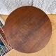 Pretty little vintage round table with tapered legs.