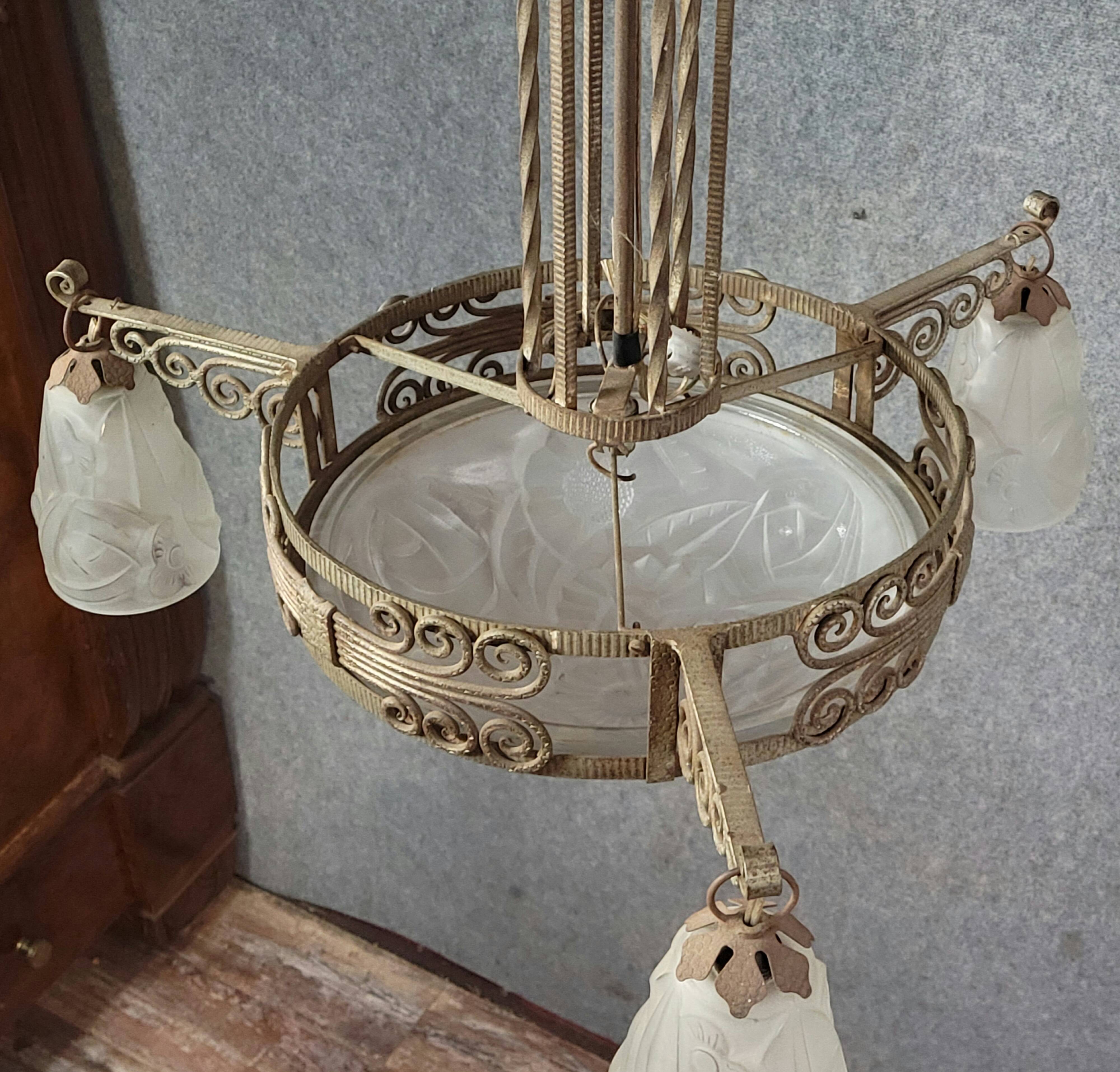 Large Art Deco chandelier, made of finely wrought wrought iron.