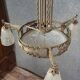 Large Art Deco chandelier, made of finely wrought wrought iron.