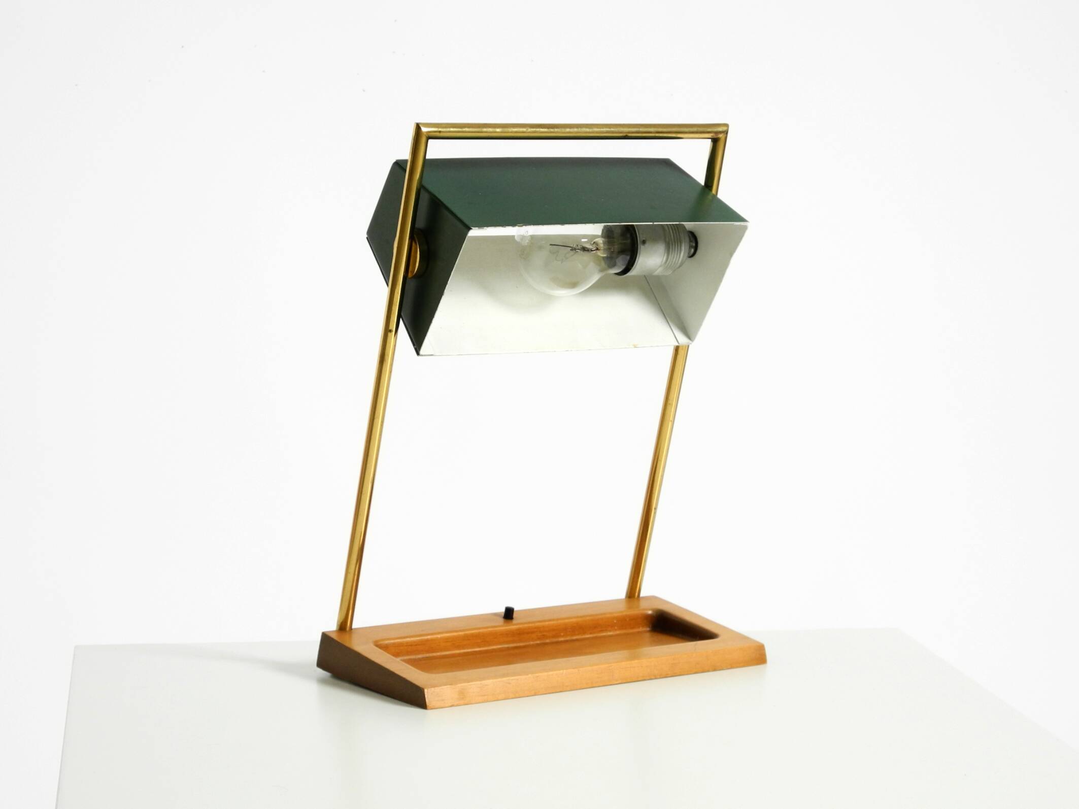 1960s Temde table lamp with a brass frame, teak base, and green lampshade