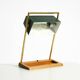 1960s Temde table lamp with a brass frame, teak base, and green lampshade