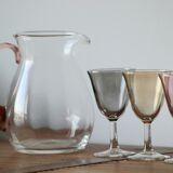 10 foot glasses and a glass pitcher