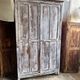 Large Parisian oak wardrobe from the early 20th century with an antique white patina