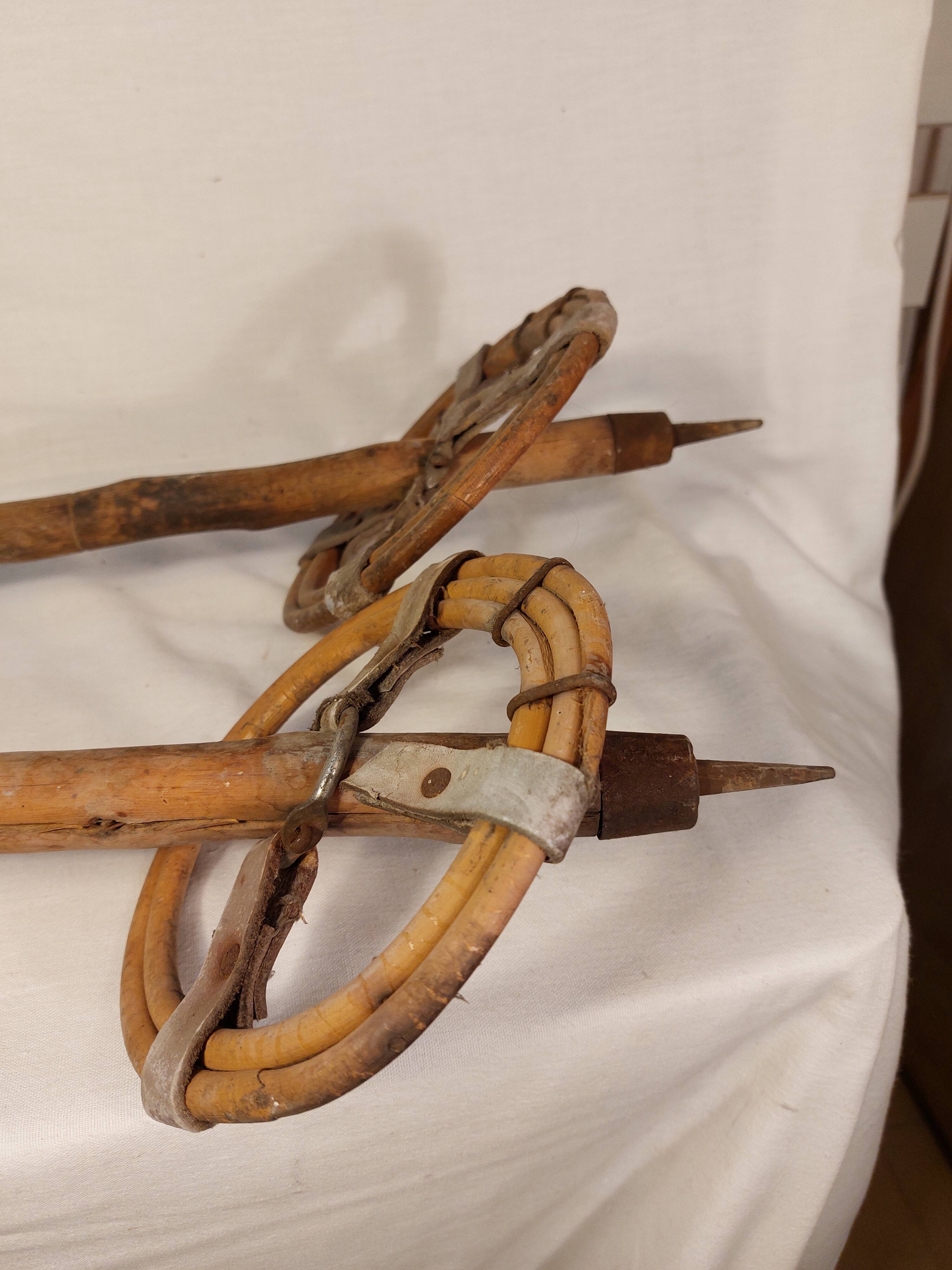 Old wooden and rattan ski poles