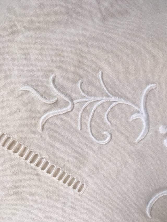 Mixed-race sheet with JPG monogram.