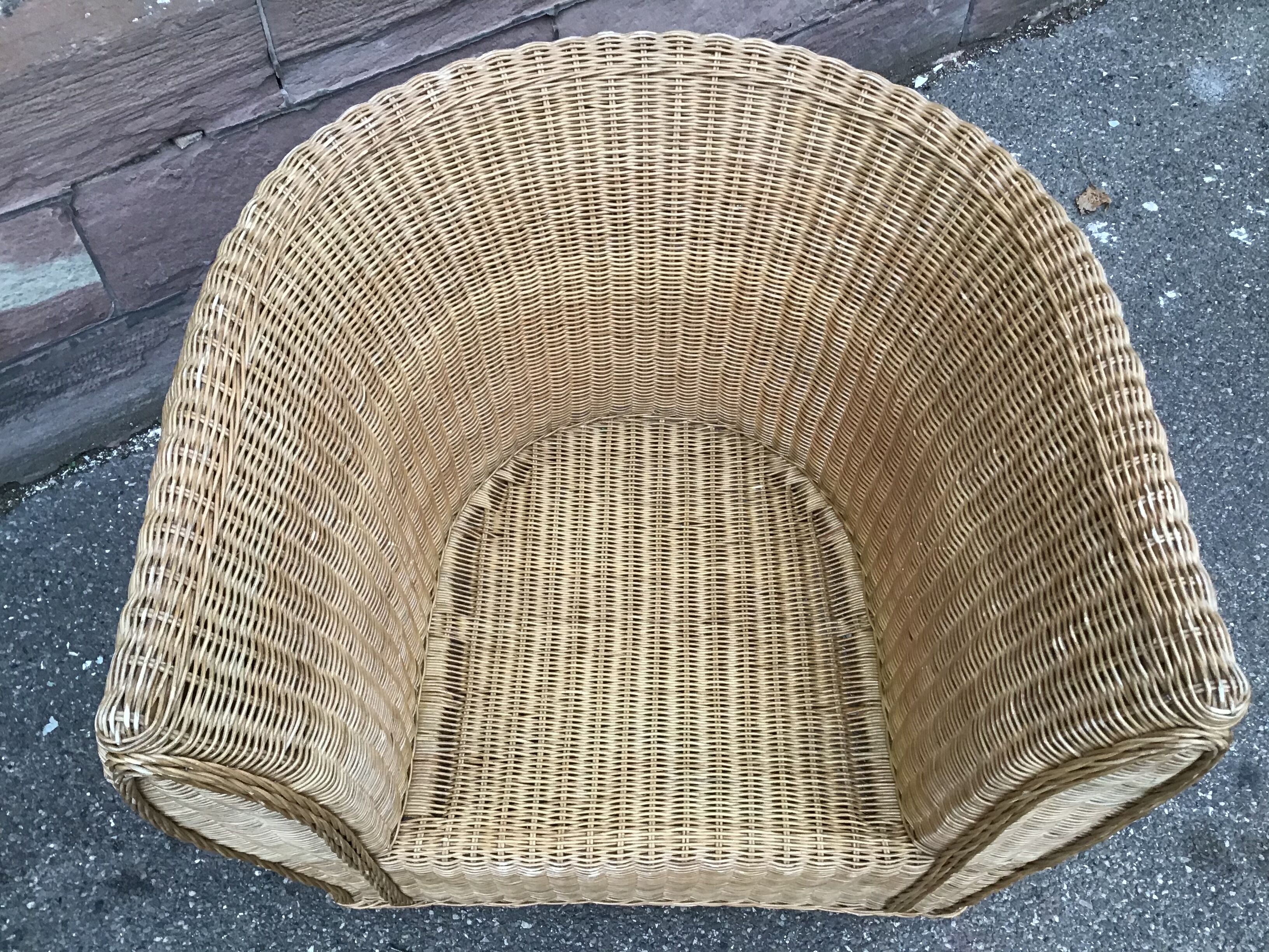 Vintage gondola armchair in rattan 1980