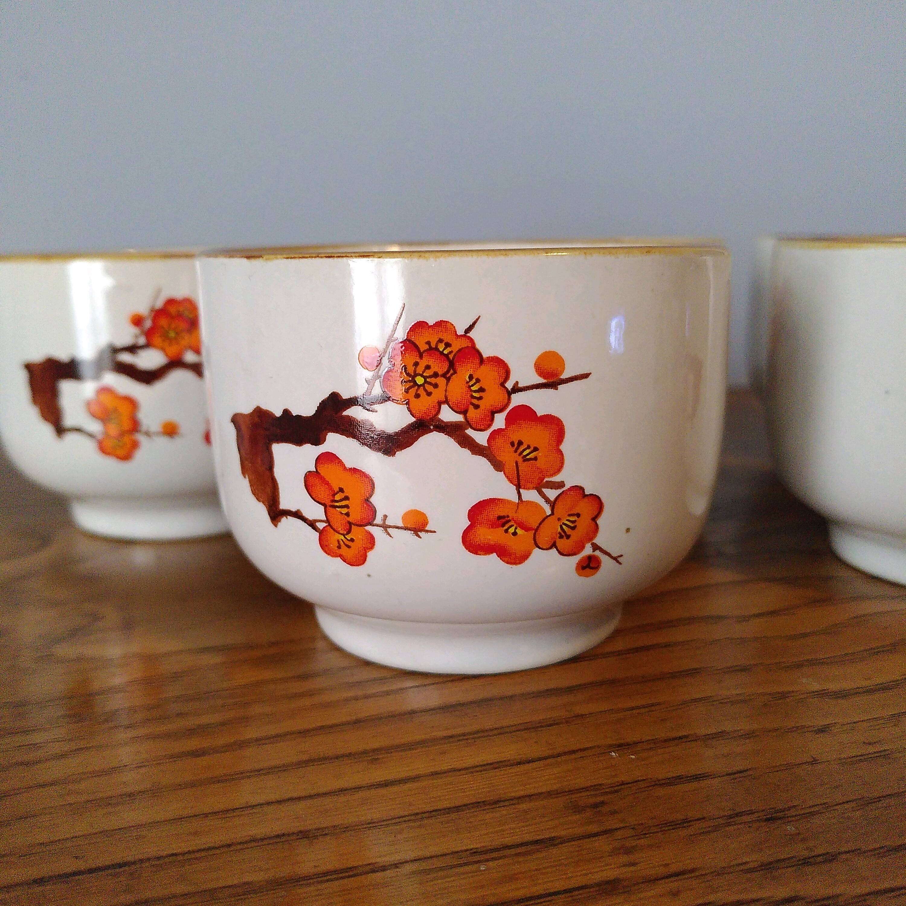 Orange flower tea cups
