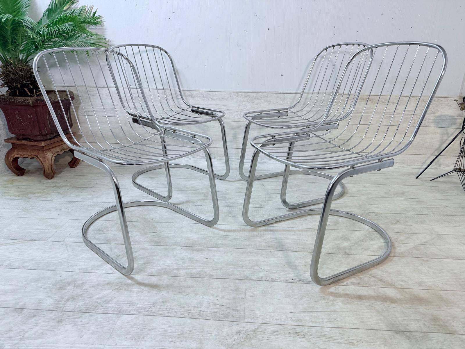 4 chrome chairs