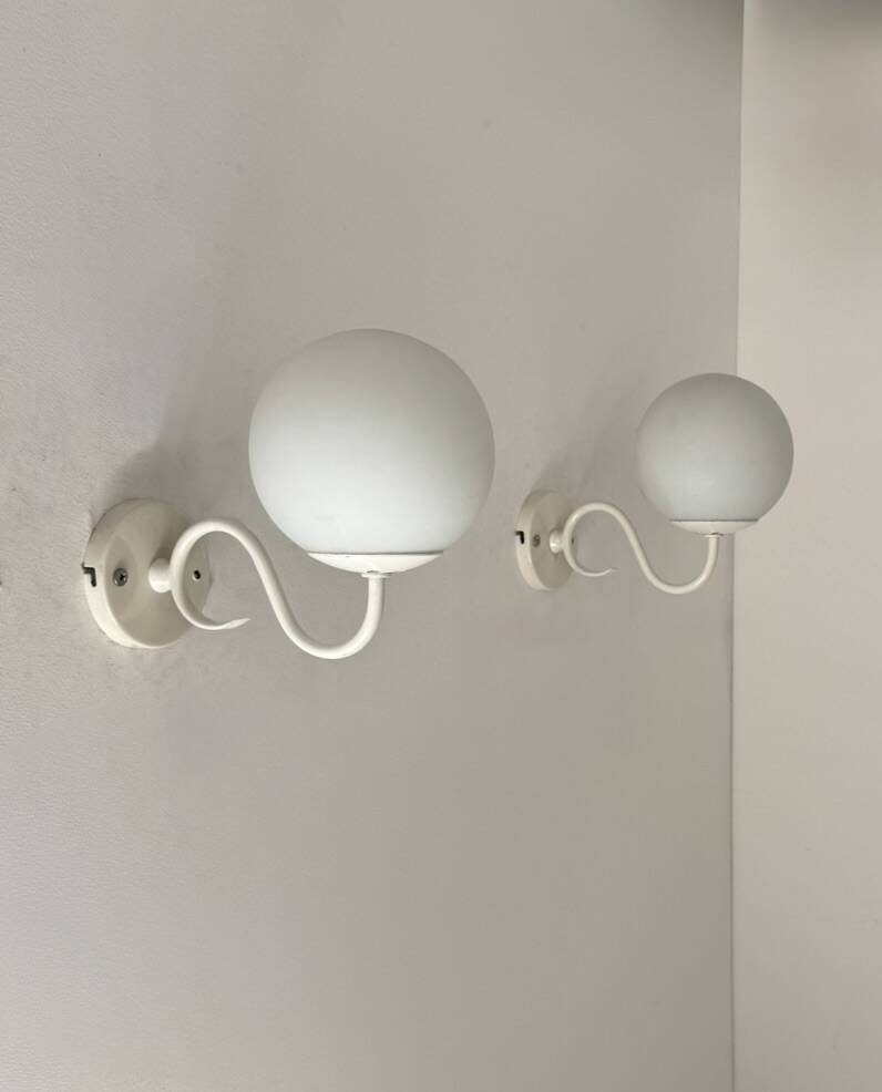 Pair of vintage metal and opaline wall lights, France, 1980.