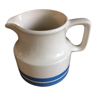 Porcelain pitcher stamped Oxford Ireland. Wide blue stripes on a white background