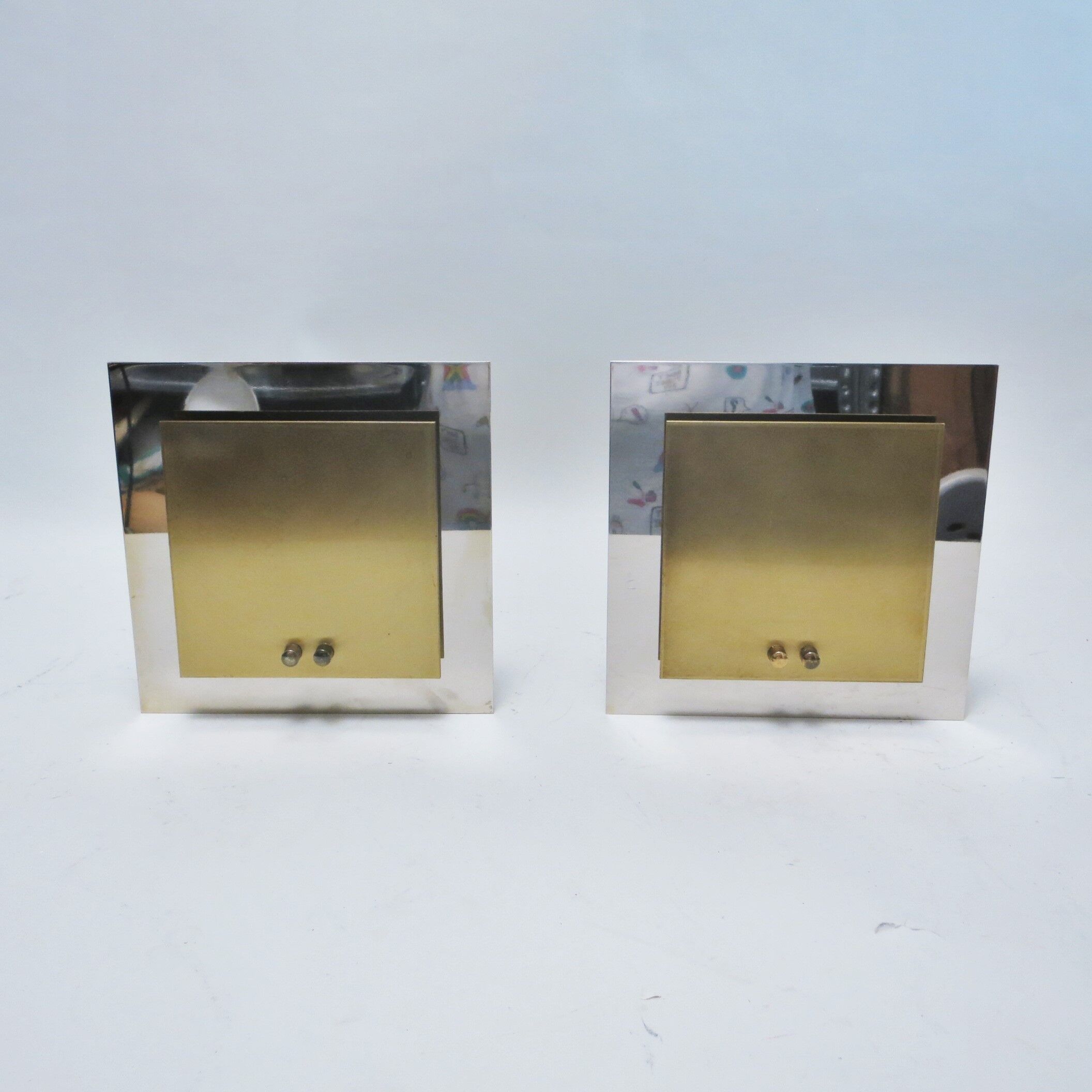 Pair of square metal and brass wall sconces