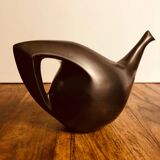 Black enameled ceramic service.
