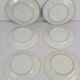 6 flat plates decorated with barbs