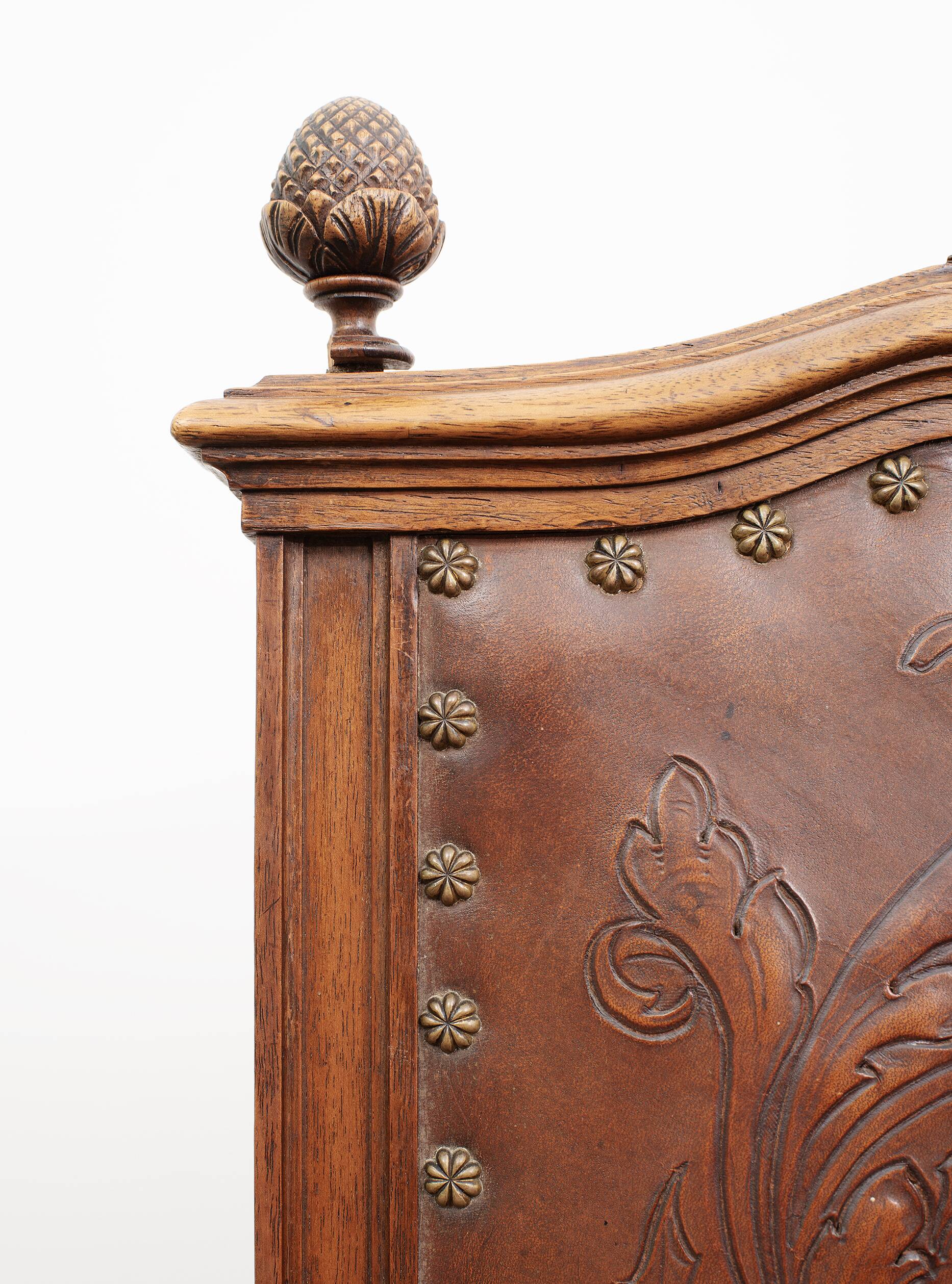 Set of 4 Louis XVI style chairs in carved wood and embossed leather.