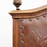 Set of 4 Louis XVI style chairs in carved wood and embossed leather.